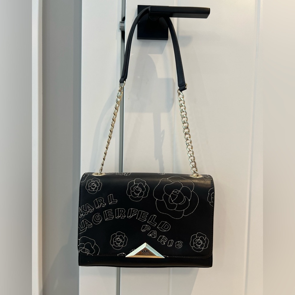 Karl Lagerfeld Leather shoulder bag with white stitching and gold hardware.